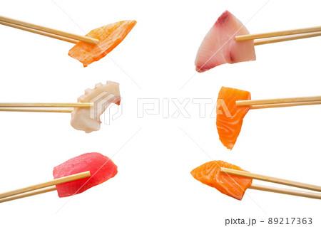 sashimi slice in chopsticks isolated on white background sashimi slice in chopsticks isolated on white background 89217363