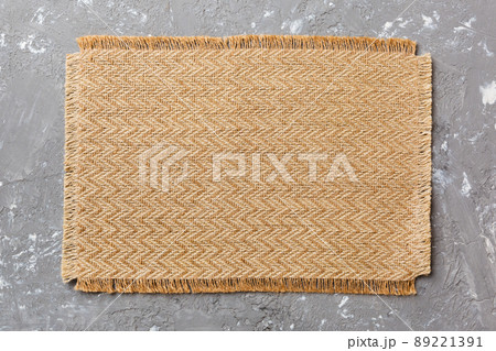 Top view of brown tablecloth for food on cement background. Empty space for your design 89221391
