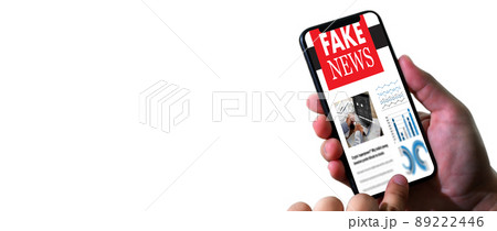 Close up of man reading fake news on smartphone screen application media technology on website Fake Newspaper Close up of man reading fake news on smartphone screen application media technology on website Fake Newspaper 89222446