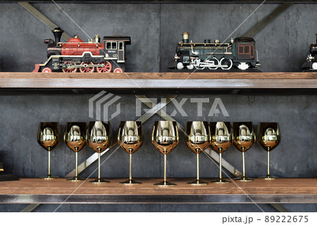 Train model and gold cup decorate on shelf 89222675