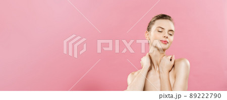 Beauty Concept - Beautiful Woman with Clean Fresh Skin close up on pink studio. Skin care face. Cosmetology. Beauty Concept - Beautiful Woman with Clean Fresh Skin close up on pink studio. Skin care face. Cosmetology. 89222790