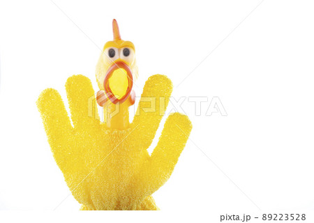 image of rubber chicken glove white background  89223528