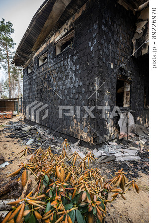 Hostomel, Kyev region Ukraine - 09.04.2022: Cities of Ukraine after the Russian occupation. Houses that burned down after being hit by rockets, mines. Irpin, Bucha, Gostomel. Hostomel, Kyev region Ukraine - 09.04.2022: Cities of Ukraine after the Russian occupation. Houses that burned down after being hit by rockets, mines. Irpin, Bucha, Gostomel. 89226970