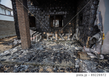 Hostomel, Kyev region  Ukraine - 09.04.2022: Cities of Ukraine after the Russian occupation. Houses that burned down after being hit by rockets, mines. Irpin, Bucha, Gostomel. 89226972