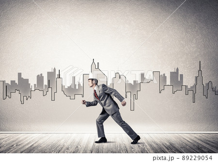 King businessman in elegant suit running and drawn cityscape silhouette at background King businessman in elegant suit running and drawn cityscape silhouette at background 89229054