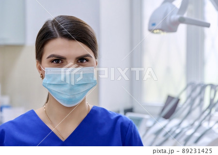 Portrait of confident female dentist doctor in office looking at camera Portrait of confident female dentist doctor in office looking at camera 89231425