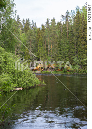 Karelian landscape with still lake in a forest Karelian landscape with still lake in a forest 89231997