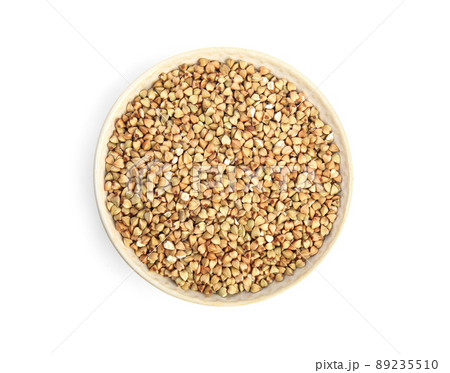 Green buckwheat in bowl isolated on white, top view Green buckwheat in bowl isolated on white, top view 89235510
