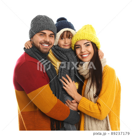 Happy family in warm clothes on white background. Winter vacation Happy family in warm clothes on white background. Winter vacation 89237179