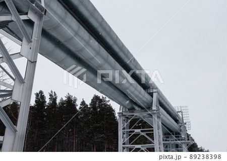 Huge gas pipeline laid along snowy street in Riga, Latvia Huge gas pipeline laid along snowy street in Riga, Latvia 89238398