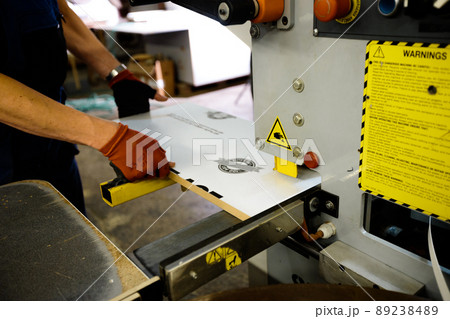 Woodwork and furniture making concept. A carpenter in the workshop doing joinery Woodwork and furniture making concept. A carpenter in the workshop doing joinery 89238489