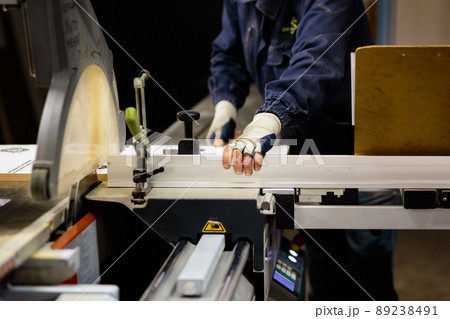 Woodwork and furniture making concept. A carpenter in the workshop doing joinery Woodwork and furniture making concept. A carpenter in the workshop doing joinery 89238491