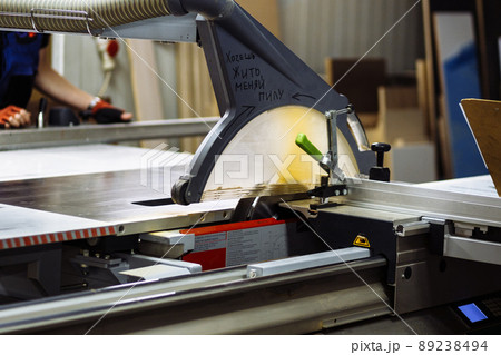 Woodwork and furniture making concept. A carpenter in the workshop doing joinery Woodwork and furniture making concept. A carpenter in the workshop doing joinery 89238494