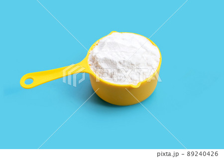 Baking soda on blue background. 89240426