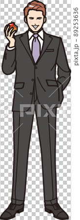 A man biting an apple whole body 89253636