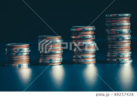 Pile of gold coins stack in finance treasury deposit bank account for saving Pile of gold coins stack in finance treasury deposit bank account for saving 89257428