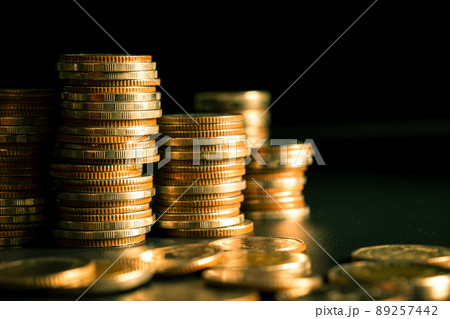 Pile of gold coins stack in finance treasury deposit bank account for saving Pile of gold coins stack in finance treasury deposit bank account for saving 89257442