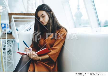 Secretary planning work writing on notebook 89257556