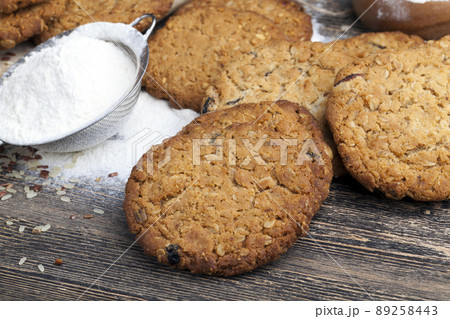 wheat-oatmeal cookies with peanuts, closeup wheat-oatmeal cookies with peanuts, closeup 89258443