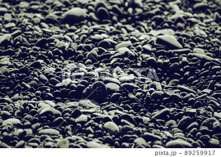Black pebbles background 89259917