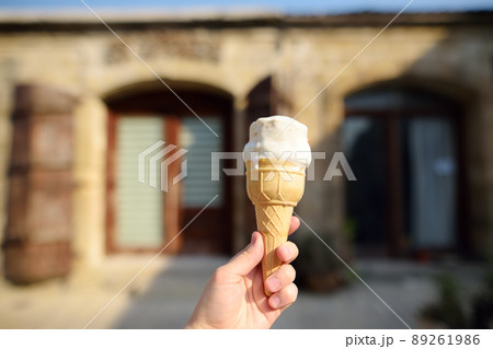 Person holding ice cream. Cold healthy dessert is favorite summer treat 89261986