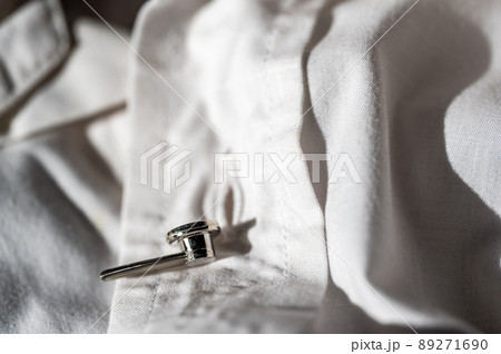 button extender shown on a white dress shirt to increase size button extender shown on a white dress shirt to increase size 89271690