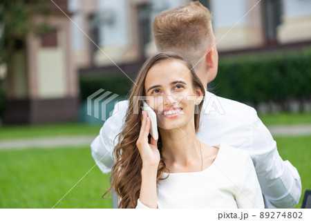 Young attractive woman talking on the phone 89274802