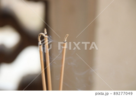 Incense sticks are burning. Incense sticks are burning. 89277049