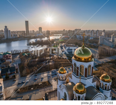 Early spring or autumn Yekaterinburg and Temple on Blood in clear sunset. Aerial view of Yekaterinburg, Russia. Translation of the text on the temple Early spring or autumn Yekaterinburg and Temple on Blood in clear sunset. Aerial view of Yekaterinburg, Russia. Translation of the text on the temple 89277288