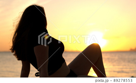 Relaxing at the beach of Miami after sunset Relaxing at the beach of Miami after sunset 89278553