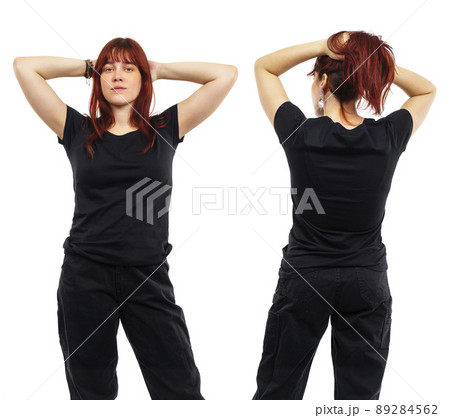 Young redhead woman posing with blank black shirt Young redhead woman posing with blank black shirt 89284562