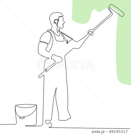 Human hand holds paint brushes with paint can 89285317