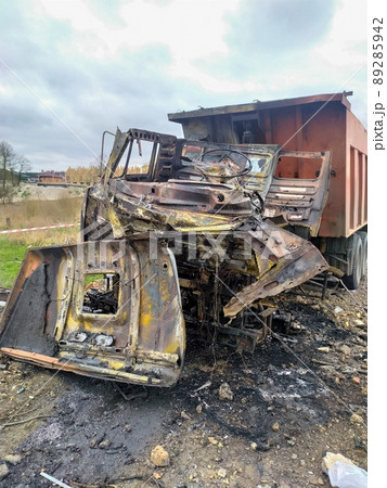 Irpin, Kyev region  Ukraine - 19.04.2022: The wreckage of a car that hit a mine of Russian soldiers, invaders. Cities of Ukraine after the Russian occupation. 89285942