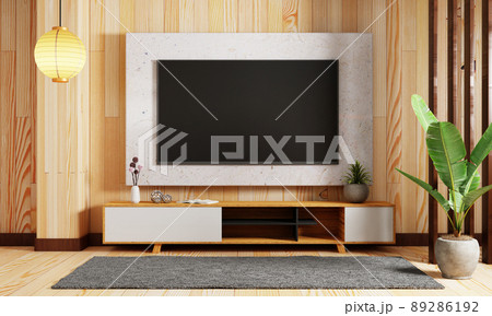 Japanese style modern living room with hanging mockup television tv on wall background. Interior and architecture concept. 3D illustration rendering Japanese style modern living room with hanging mockup television tv on wall background. Interior and architecture concept. 3D illustration rendering 89286192