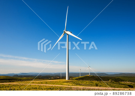 Turbines in a mountain wind farm. Ecological energy production. 89286738