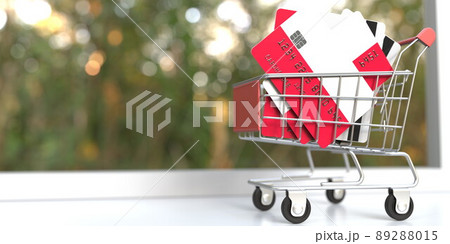 Credit card mockups with flags of Poland in a small shopping cart. 3D rendering Credit card mockups with flags of Poland in a small shopping cart. 3D rendering 89288015