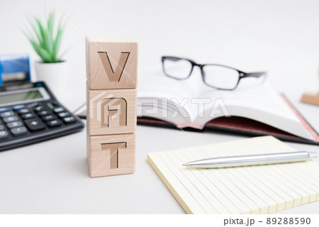 Finance and tax concept with wooden blocks Finance and tax concept with wooden blocks 89288590