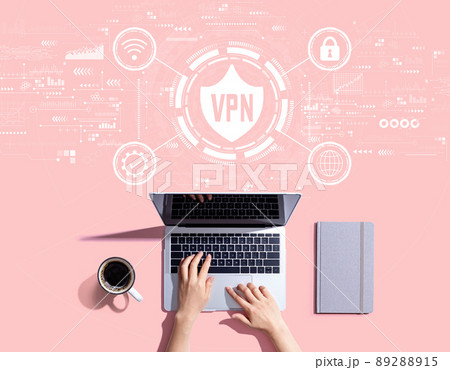 VPN concept with person using a laptop VPN concept with person using a laptop 89288915