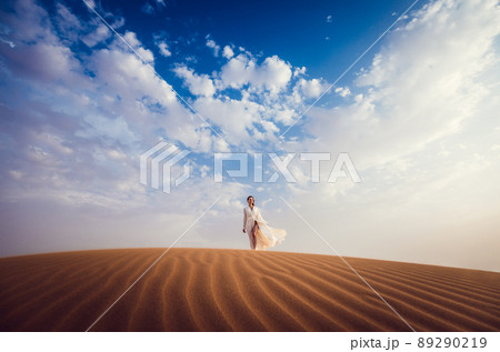 Woman finding freedom in desert 89290219