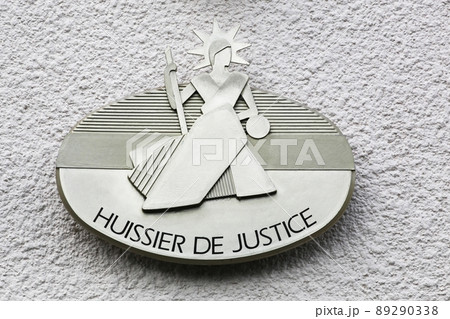 Signboard on a building of the bailiff called huissier de justice in French language 89290338