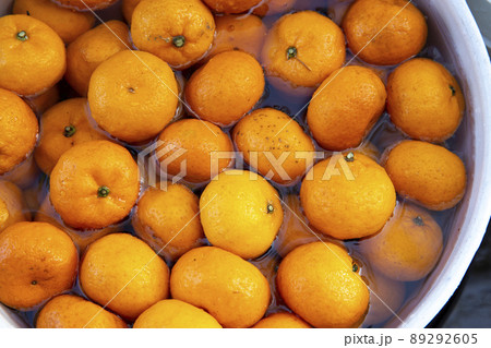 Organic fresh Mandarin oranges washed and prepared for party Organic fresh Mandarin oranges washed and prepared for party 89292605