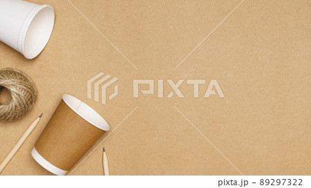 Eco friendly concept, Consist of paper cup and jute rope with pencil on wooden background Eco friendly concept, Consist of paper cup and jute rope with pencil on wooden background 89297322