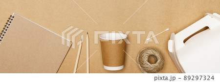 Eco friendly concept, Delivery food container and paper cup with jute rope and notebook with pencil Eco friendly concept, Delivery food container and paper cup with jute rope and notebook with pencil 89297324