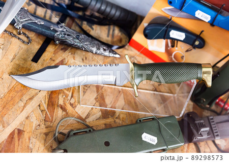 Hunting knife on showcase of an arms store 89298573