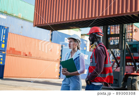 Foreman control Industrial Container Cargo freight ship at industry. Transportation and logistic. 89300308