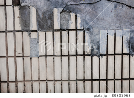 Aged scratched chipped erosion wall for retro design. 89305963