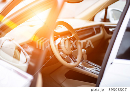 multimedia control panel on the steering wheel of a modern car 89308307
