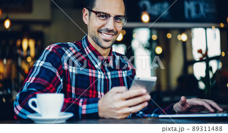 Skilled freelancer with netbook Skilled freelancer with netbook 89311488