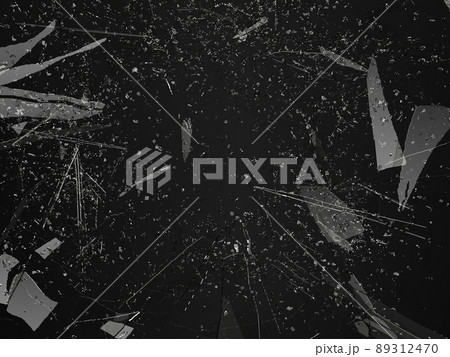 Pieces of shattered glass broken or cracked on black 89312470