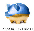 Golden pig moneybox in the color of Ukrainian flag 89318241